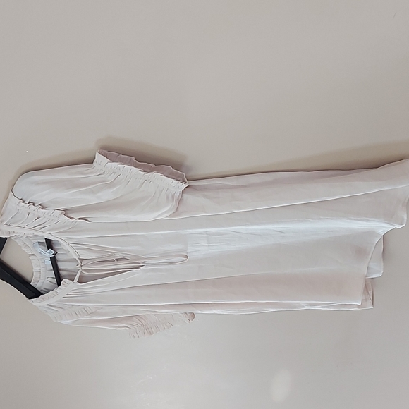 Naked Zebra blouse with tie front closure ruffle detail on the sleeve and collar - Picture 3 of 7